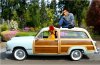 Politicians_Romney,Mitt_Mitt leaves 2012 Westminster Dog Show_Car 1950 ford woody.jpg