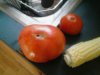 Small tomato store bought. bigger 1 I grew. 08-08.jpg