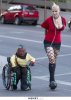 funny-wtf-leash-wheelchair.jpg