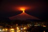 2A78155600000578-3158256-The_Villarrica_Volcano_is_seen_at_night_from_Pucon_town_Chile_Ju-a-30...jpg