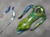 horned green oil spoon.jpg